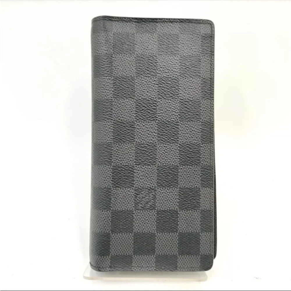 Louis Vuttton Damier Graphite wallet.